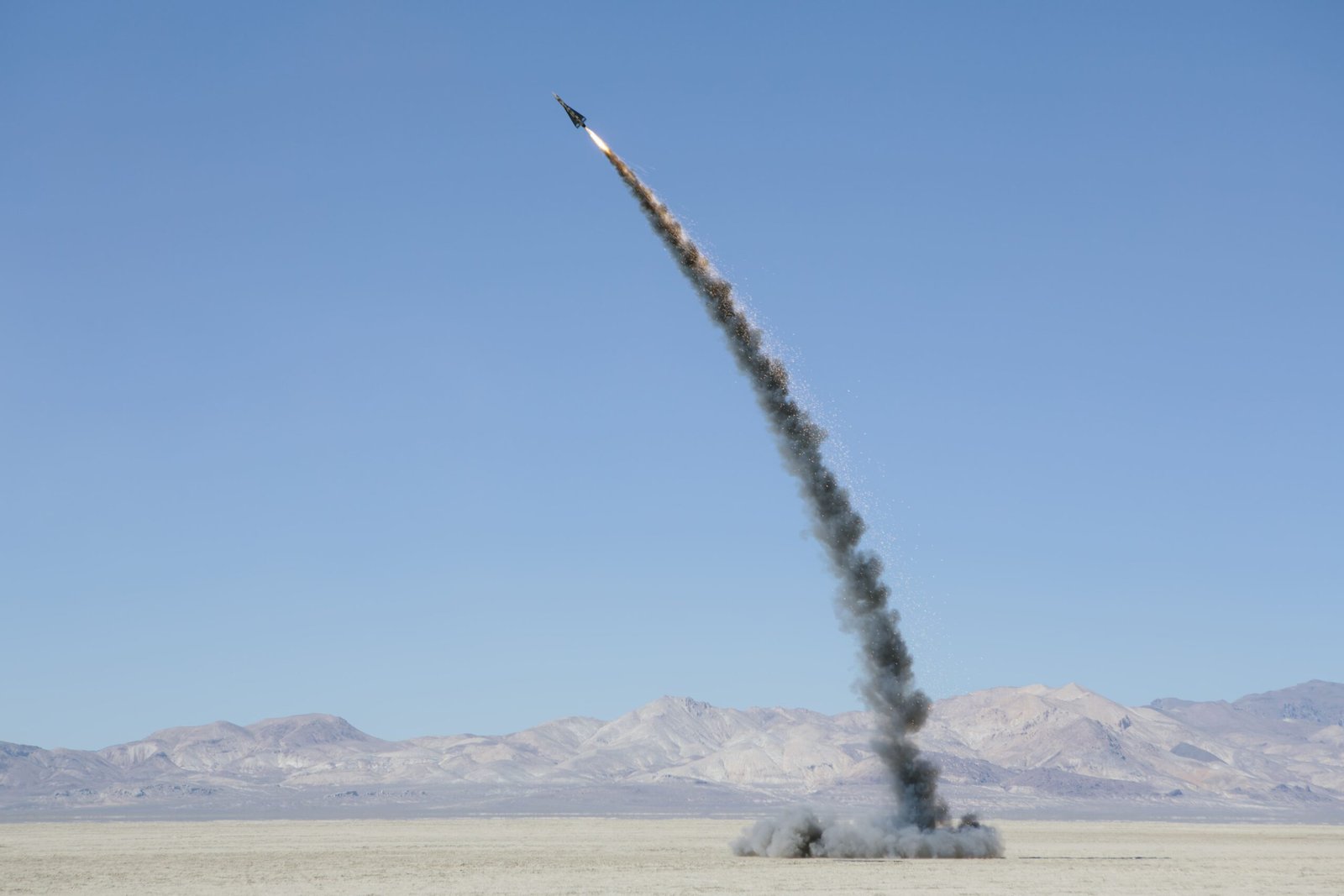 rocket-shooting-into-vast-desert-sky-black-rock-2025-04-05-08-03-49-utc