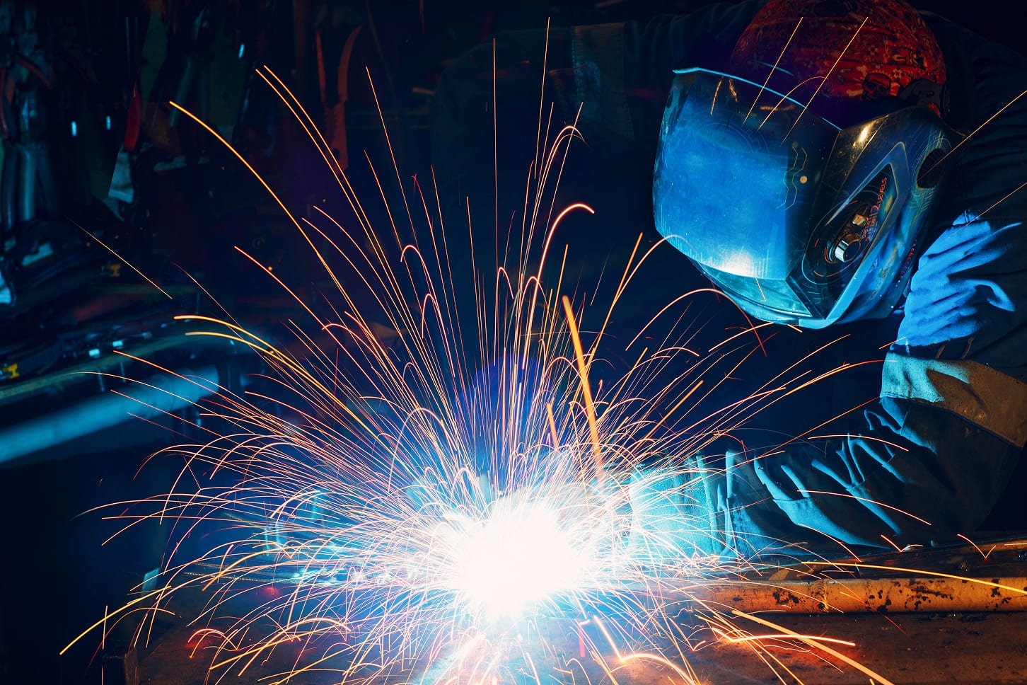 welder-welding-metal-construction-on-factory-long-2024-12-02-10-20-37-utc 1